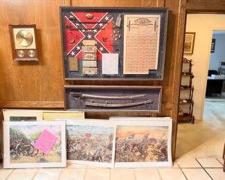 large frame contains: Confedrate issue 30 year bond with one redeemed coupon, Confedrate currency, letter from a hospital camp near Meridian Mississippi, a buckle and some relics. It is very nicely framed