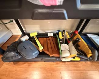 knee pads, hammers, saws, drywall tools