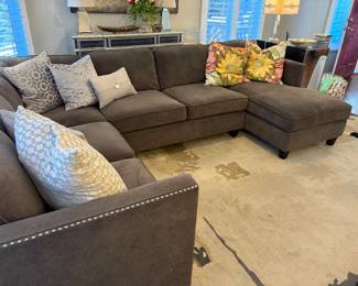 Sectional, accent pillows, area rug