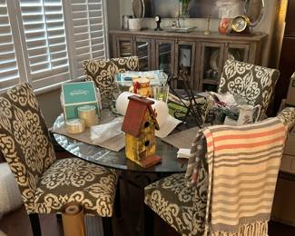 Dining table with upholstered chairs