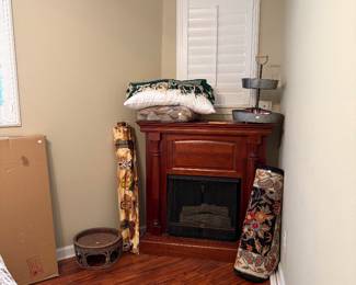 Electric fireplace, accent rugs