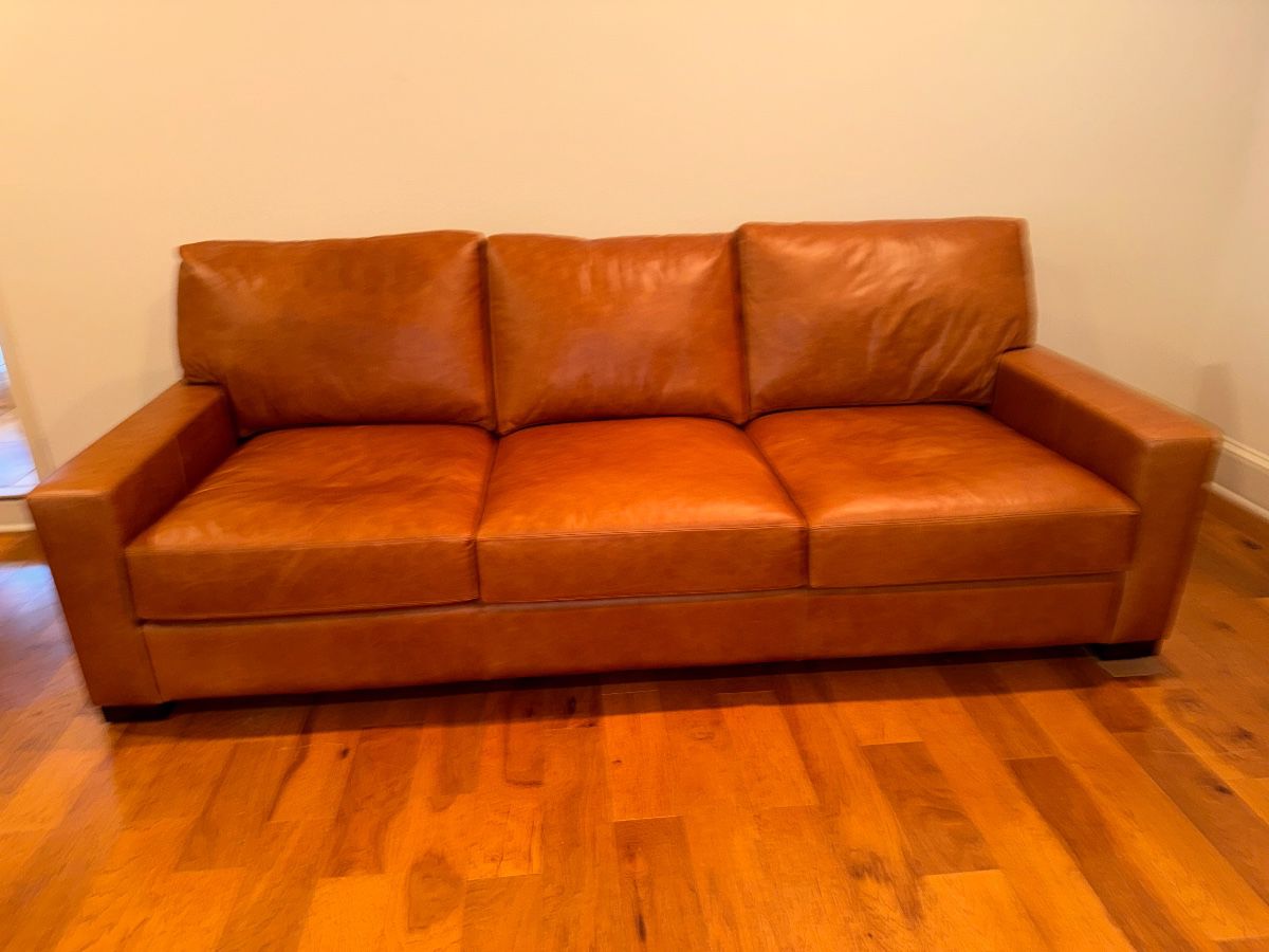 Pottery Barn Leather Sofa.  3 years old. 93 L x41 1/2h.  Available for presale. Price will be posted soon!