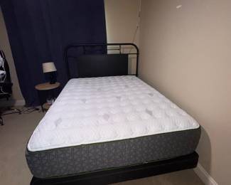 Black frame bed with newer mattress on platform. Purchased at Olinde's 2017. Approx. measurements: Bed 85x63 Mattress: 79x60. Available for presale. Price will be posted soon!