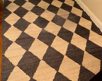 Natural fiber harlequin diamond area rug. Measures approx. 6 1/2 x 9’