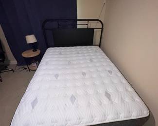 Black frame bed with newer mattress on platform. Purchased at Olinde's 2017. Approx. measurements: Bed 85x63 Mattress: 79x60. Available for presale. Price will be posted soon!