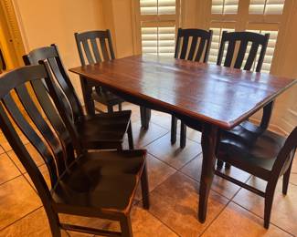 Kitchen table w/6 chairs. Purchased from All Wood Furniture. 9 years old. Approx. Measurements: 60x36