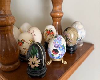 vintage decorative eggs featuring hand-painted floral designs or cloisonné enamel work