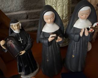 vintage Napco nun figurines likely date from the 1960s, on right