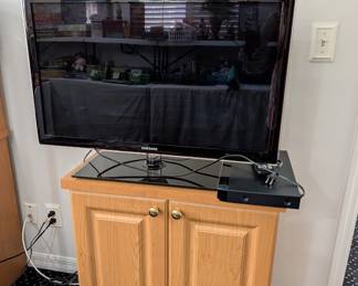 Samsung TV, storage cabinet