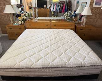 King size adjustable bed, 1980's Thomasville storage headboard, and tables