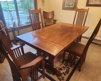 Mission style dining table with 2 leaves and 4 chairs