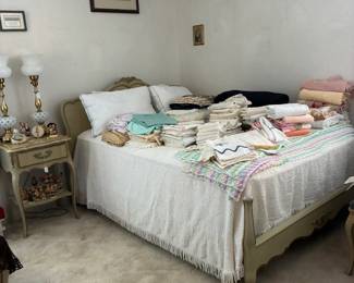 Linens and queen bed