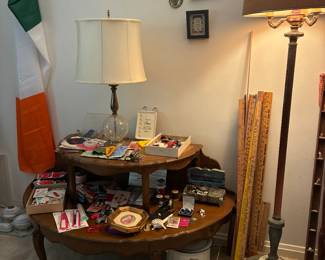 Irish plaques on wall, vintage lamps, yardsticks