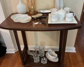 Side Table with serving dishes and Nun Sculpture
