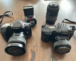 camera gear including a pair of 35 mm Minoltas