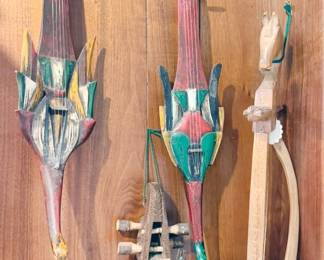 Vintage wooden string instruments: Nepali strange, Yugoslavia gusla, Indonesian hasapi (lute)