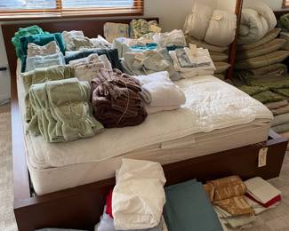 Bedding and Plummers Queen Bed