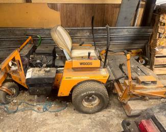 Woods mower with 2 attachments