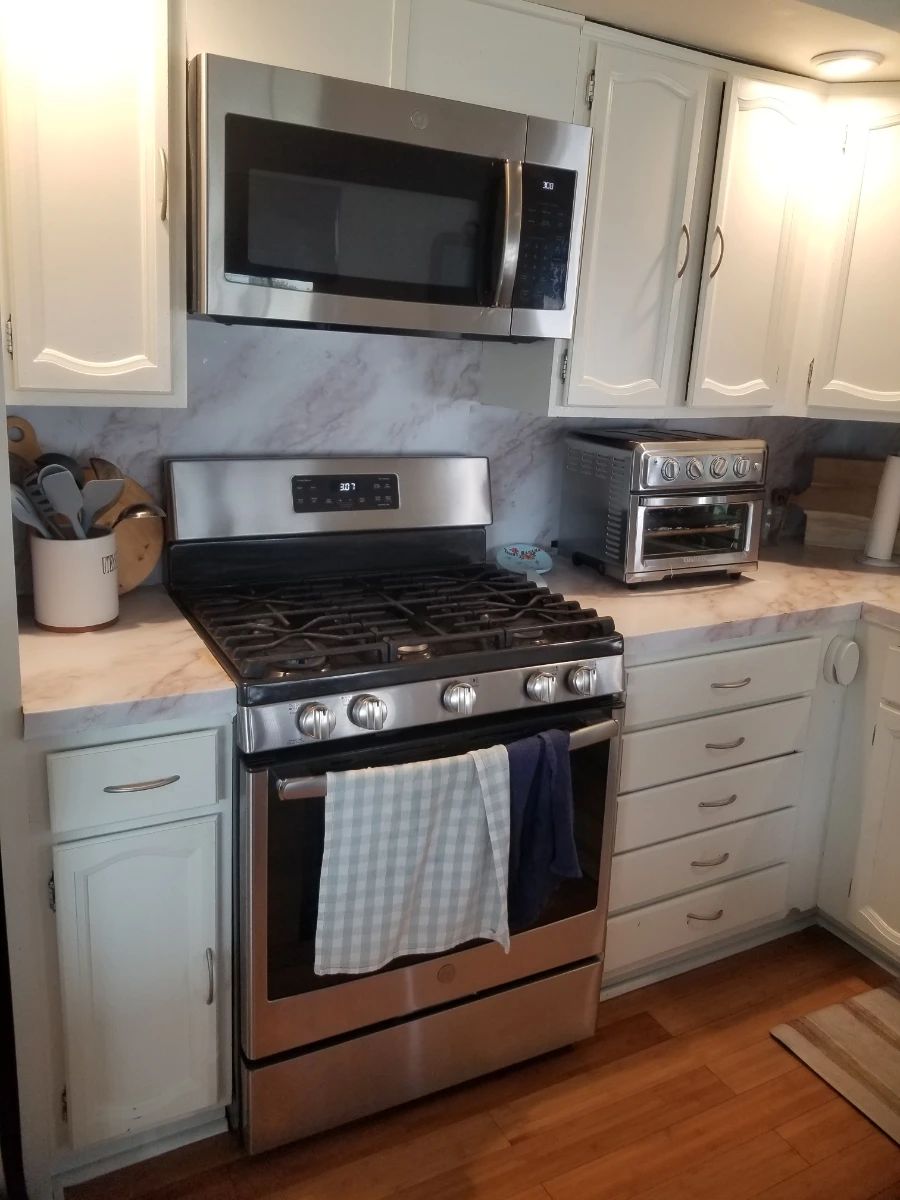 GE gas range; GE microwave oven mfg. July 2019