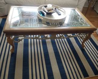 Glass top coffee table; area rug