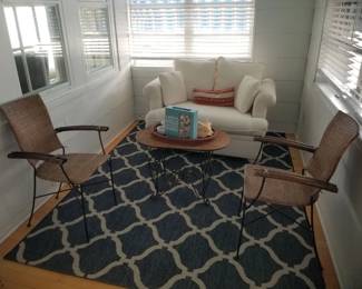 Area rug; loveseat is a sleeper sofa! Tray table