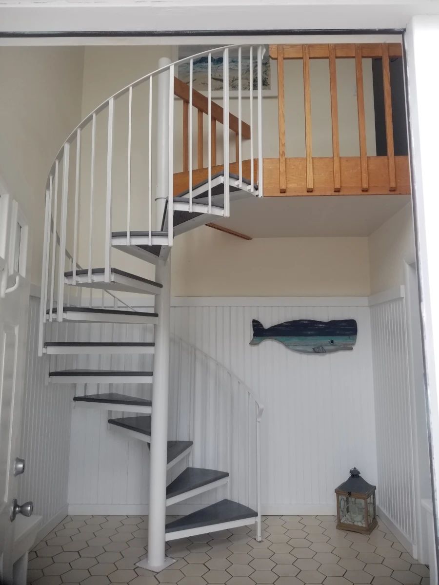 Spiral staircase with wood treads
