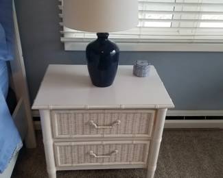 Two-drawer nightstand; table lamp