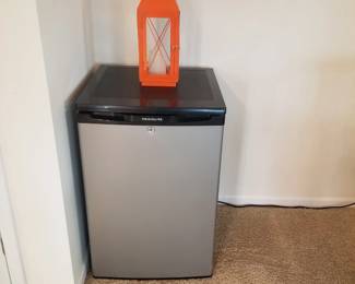 Dorm fridge; orange lantern