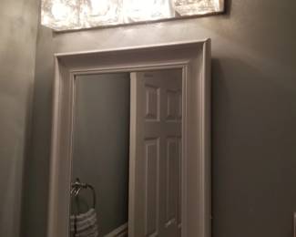 Mirrored medicine cabinet; vanity lights