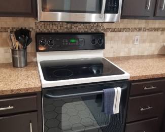 Electric range - biscuit color; Samsung microwave oven