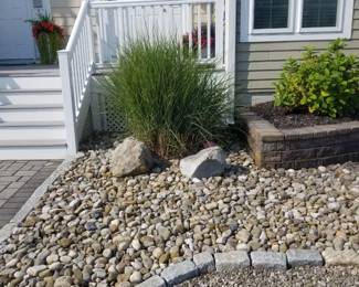Vinyl railing; Belgian blocks; rocks