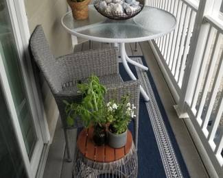 Patio dining table; all weather wicker chair (four available); rug; cocktail table (two available)
