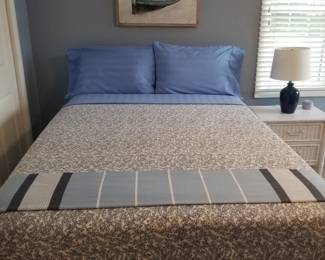 Full/double bed; artwork