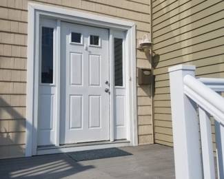Entry door with two side lights