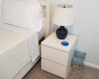 2-drawer white lacquer nightstand; table lamp