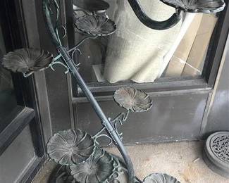 Cast iron candelabra/plant stand.