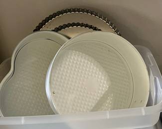 Assorted Baking Pans including Heart-Shaped Cake Pan, Round Geometric Pattern Cake Pan, and Fluted Tart Pan