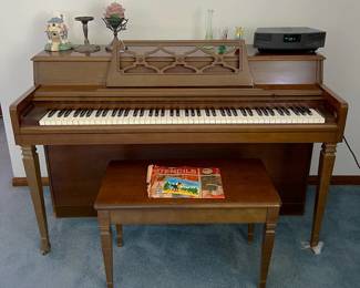This spinet-style piano would fit in almost any space.
