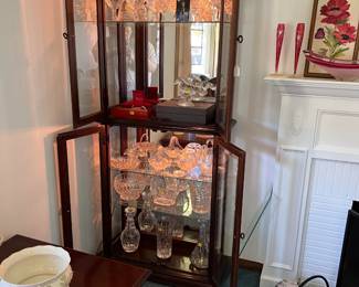 Here we have one of two matching display cabinets with glass shelves.