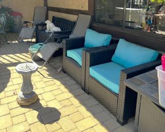 Outside there are several pieces of patio furniture, including a sundial (which is not terribly common).