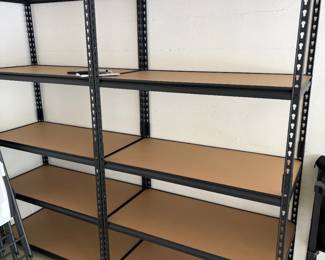 Metal shelving units. Sold as a pair 39 inches wide by 20 inches deep by 70 inches high.