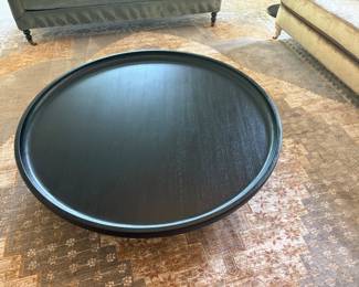 $640 Anthropologie charcoal stained teak coffee table. 52" diam. X 11.5"h.