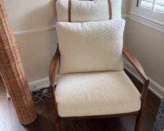 $900 L H Imports wood framed with bouclé cushions lounge chair. 29"w x 30"d x 46"h. Originally $1300.