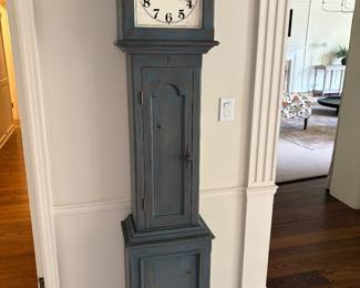 $120 Battery operated clock with storage shelves. 76"h X 9.5"d X 15"w.