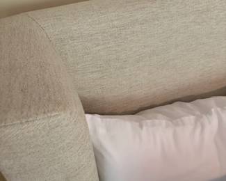 close up of headboard detail and fabric.