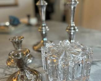 Large silver plate candlesticks, small sterling candlesticks, and Mikasa crystal snowflake