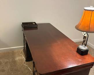 Desk With Lamp Swinging Golfer