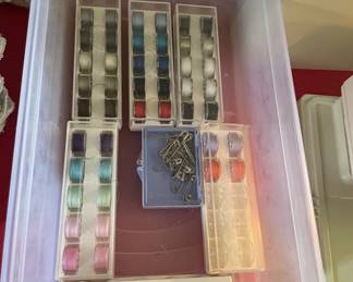 Sewing machine bobbins