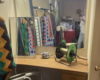 Cord winder and mirrored wall cabinet