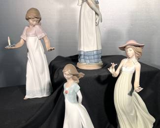 "To Light the Way" and othe Lladro porcelain figures